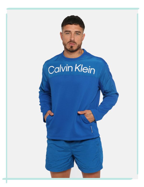 Felpa Calvin Klein Blu - Felpa con girocollo classico in total blu elettrico. Presente tessuto traforato e logo brand bianco