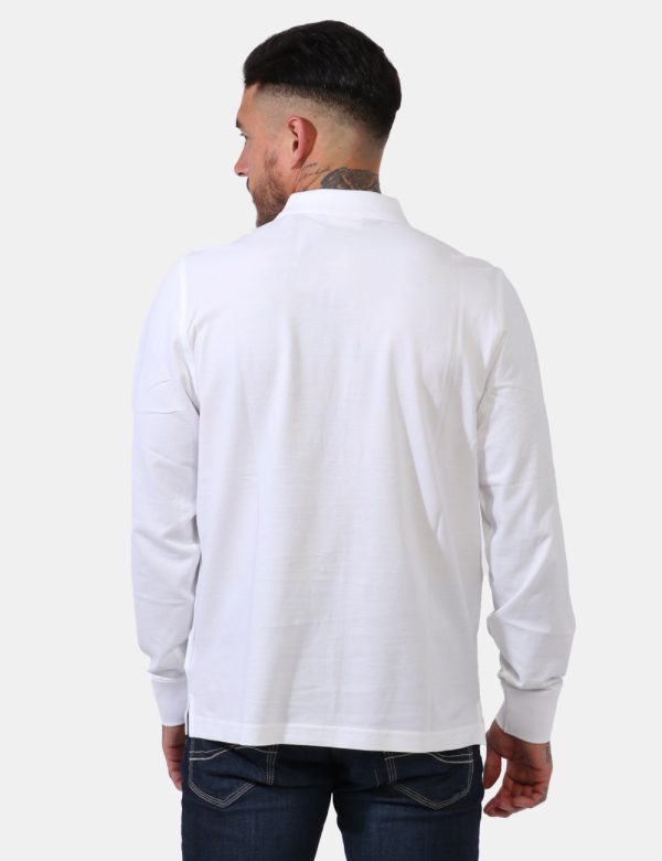 Polo Gant Bianco - Polo a maniche lunghe in total bianco con patch logo brand applicato ad altezza cuore. Presente colletto