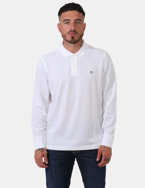 Polo Gant Bianco - Polo a maniche lunghe in total bianco con patch logo brand applicato ad altezza cuore. Presente colletto