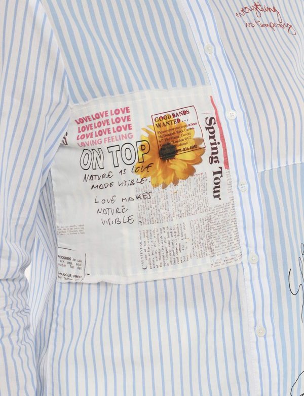 Camicia Desigual rigata azzurra - COMPOSIZIONE E VESTIBILITÀ:100% cotoneLa modella è alta 170 cm e indossa la taglia S. La v