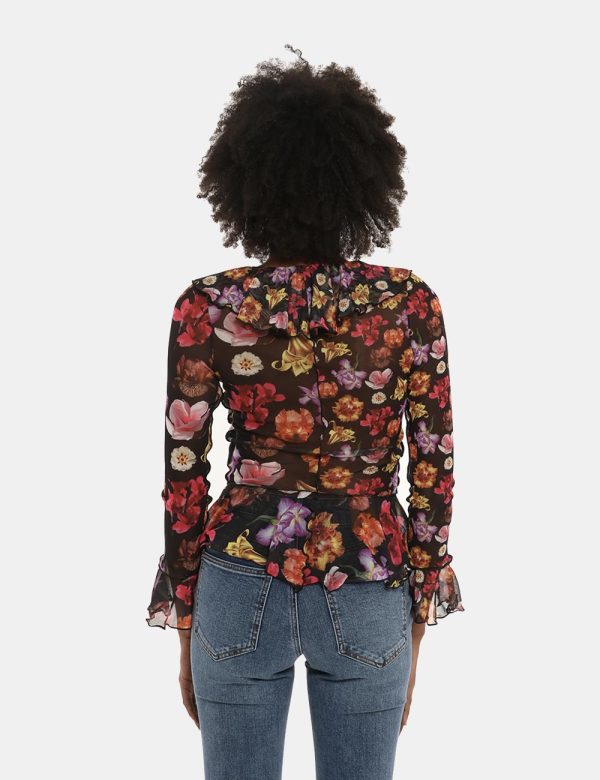 Maglia Desigual fantasia floreale - COMPOSIZIONE E VESTIBILITÀ:97% poliestere 3% elastaneLa modella è alta 170 cm e indossa
