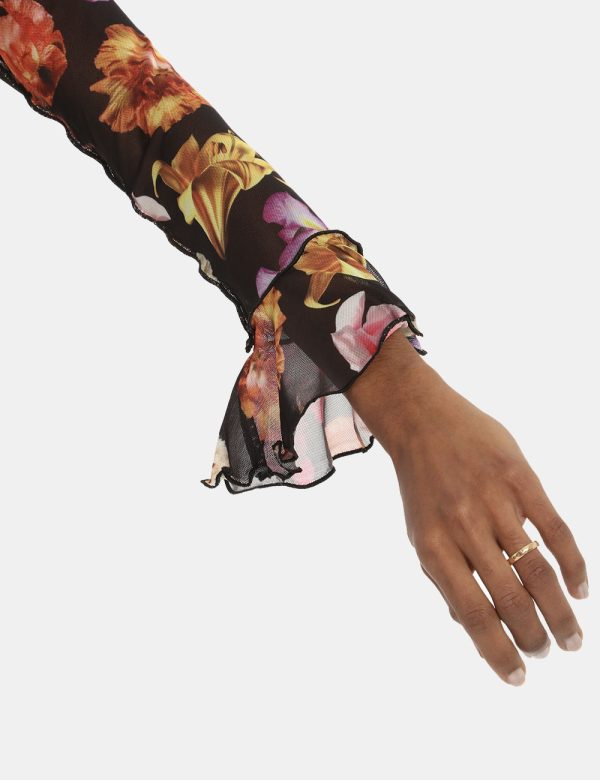 Maglia Desigual fantasia floreale - COMPOSIZIONE E VESTIBILITÀ:97% poliestere 3% elastaneLa modella è alta 170 cm e indossa