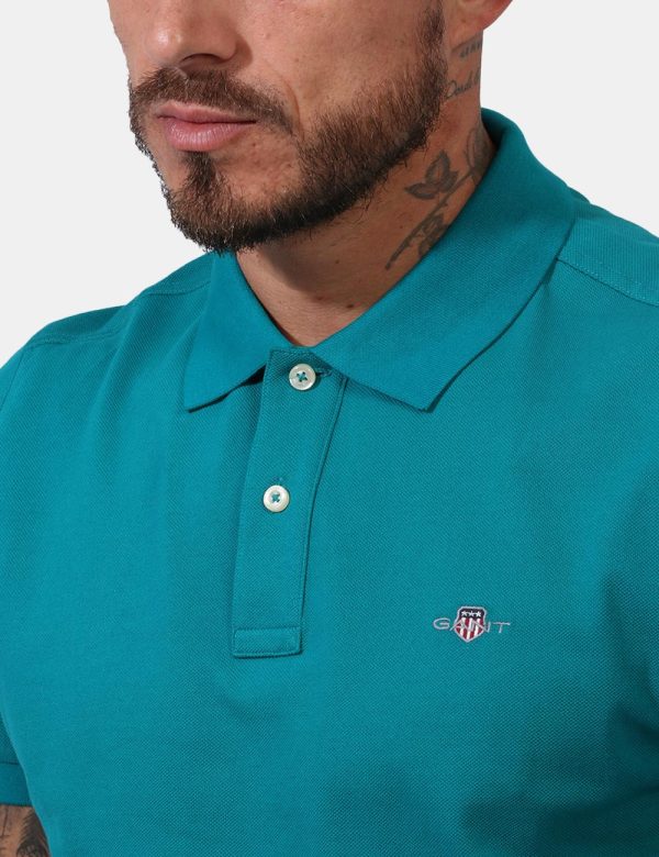 Polo Gant Verde - Polo in total verde intenso con patch logo brand applicato ad altezza cuore. Presente colletto alla peter