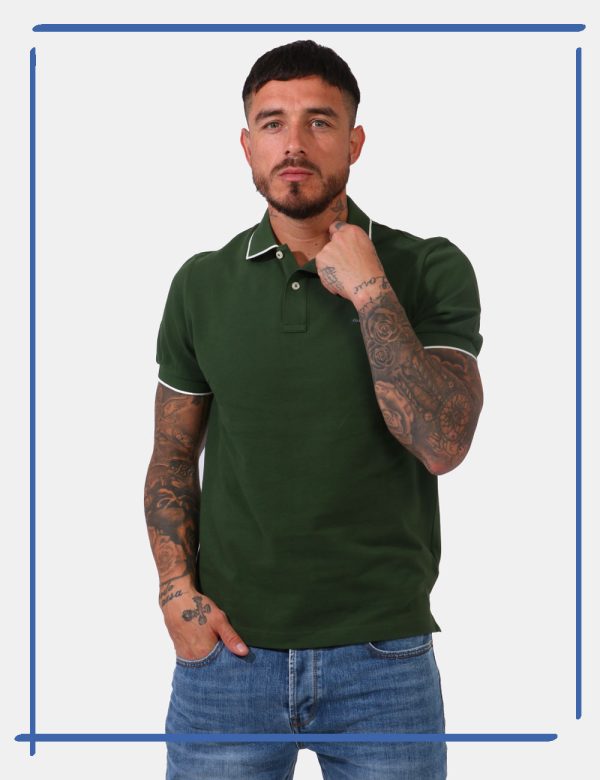 Polo Gant Verde - Polo in fantasia rigata rosa e verde con logo brand ricamato ad altezza cuore. Presente colletto alla pete