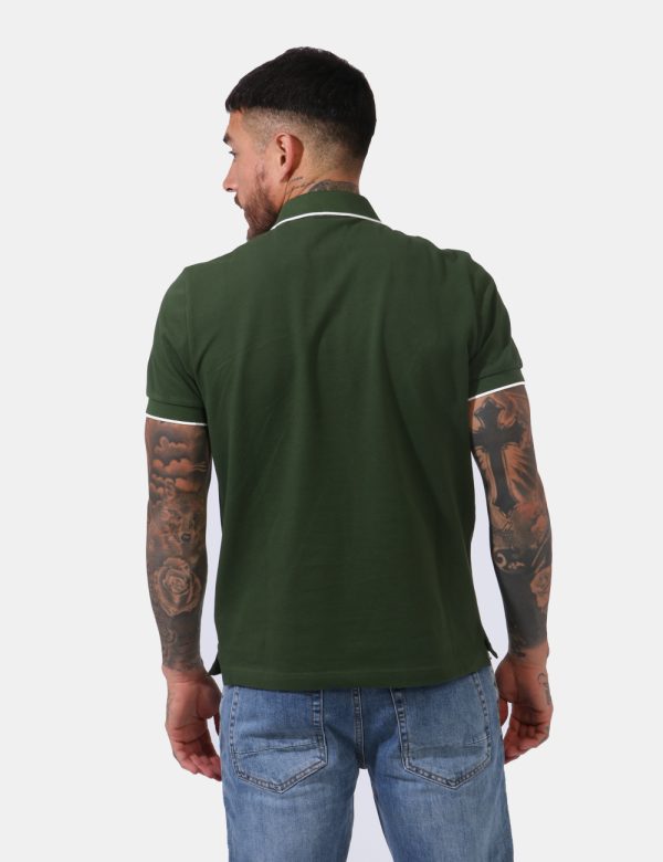 Polo Gant Verde - Polo in fantasia rigata rosa e verde con logo brand ricamato ad altezza cuore. Presente colletto alla pete