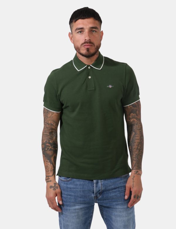 Polo Gant Verde - Polo in fantasia rigata rosa e verde con logo brand ricamato ad altezza cuore. Presente colletto alla pete