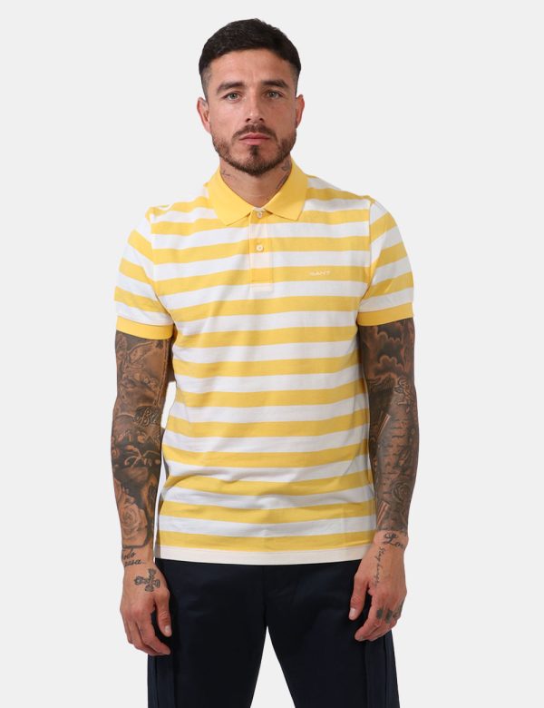 Polo Gant Giallo - Polo in fantasia rigata bianco e giallo limone con logo brand ricamato ad altezza cuore. Presente collett