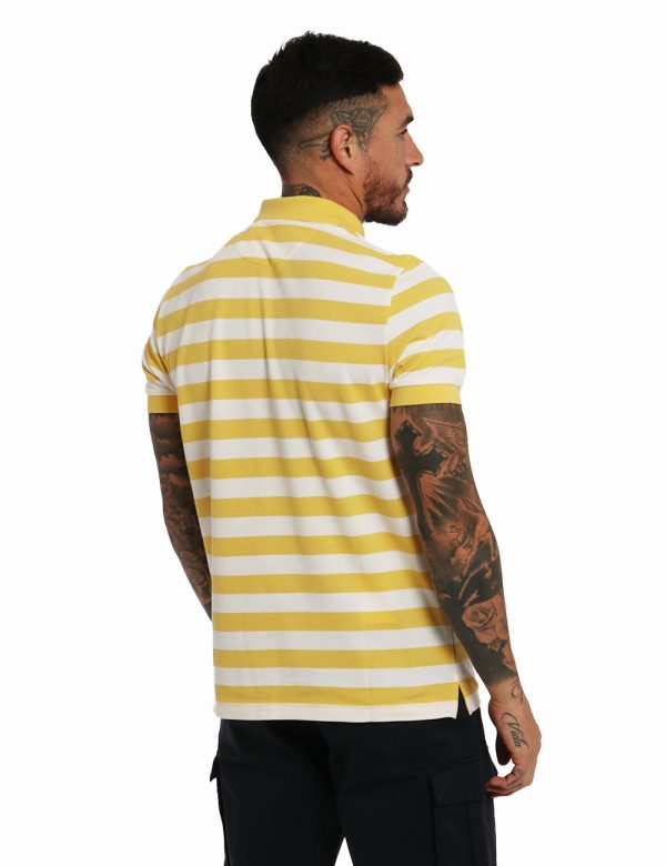 Polo Gant Giallo - Polo in fantasia rigata bianco e giallo limone con logo brand ricamato ad altezza cuore. Presente collett