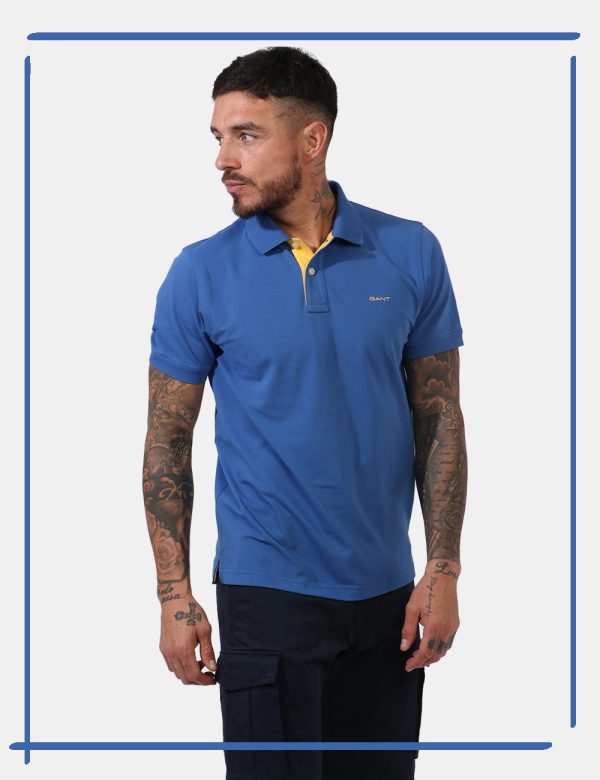 Polo Gant Blu - Polo in total blu ceruleo con patch logo brand applicato ad altezza cuore e profili in giallo pastello. Pres