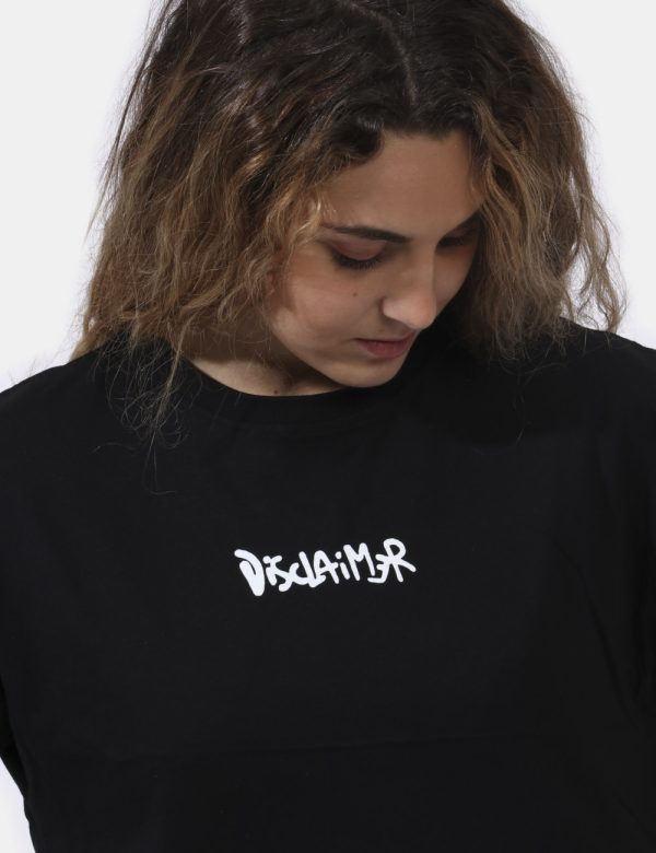 T-shirt Disclaimer Nero - T-shirt corta su sfondo nero con stampa logo brand bianco sul fronte e big stampa logo brand sul r