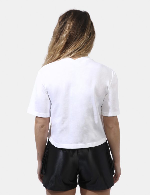 T-shirt Disclaimer Bianco - T-shirt corta su sfondo bianco con stampa logo brand ad altezza spalla in nero e glitter argenta