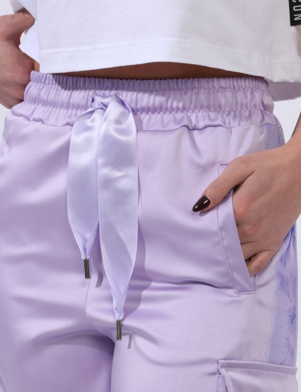 Pantaloni Disclaimer Viola - Pantaloni larghi a trequarti in total lilla lucido con tasche a taglio trasversale più tasche a