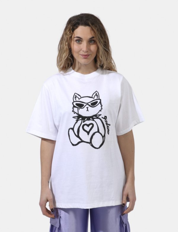 T-shirt Disclaimer Bianco - T-shirt su sfondo bianco con stampa stilizzato gattino in glitter neri. La vestibilità è morbida