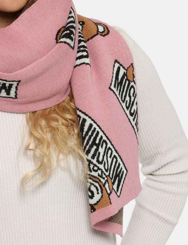 Sciarpa Moschino rosa - COMPOSIZIONE E VESTIBILITÀ:50% lana 50% acrilica CONSIGLI DI STILE:Sciarpa in misto lana su base ros