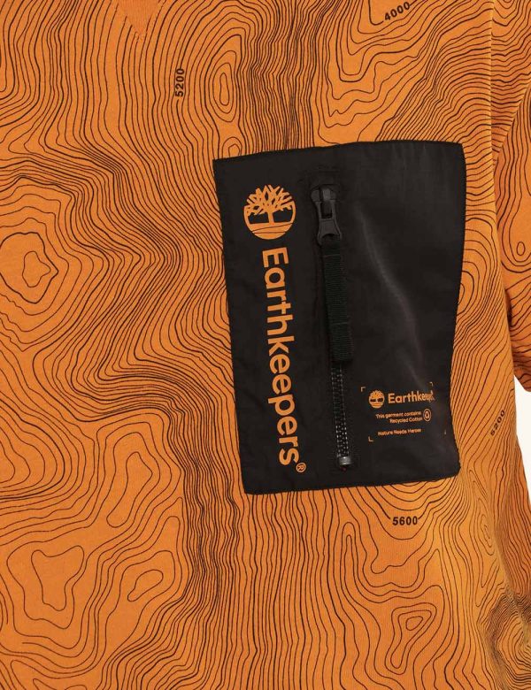 T-shirt Timberland arancione con stampa - COMPOSIZIONE E VESTIBILITÀ:100% cotoneIl modello è alto 170 cm e indossa la taglia