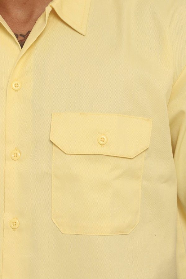 Camicia Dickies giallo - COMPOSIZIONE E VESTIBILITÀ:65% poliestere 35% cotoneIl modello è alto 178 cm e indossa la taglia M.