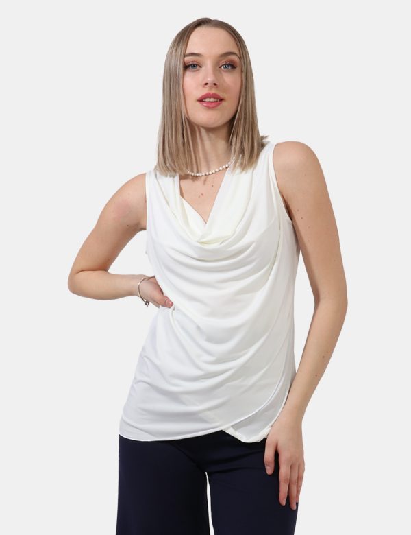 Top Vougue Bianco - Top a giromanica lungo in total bianco panna con scollo morbido. La vestibilità è pratica e regolare. Il