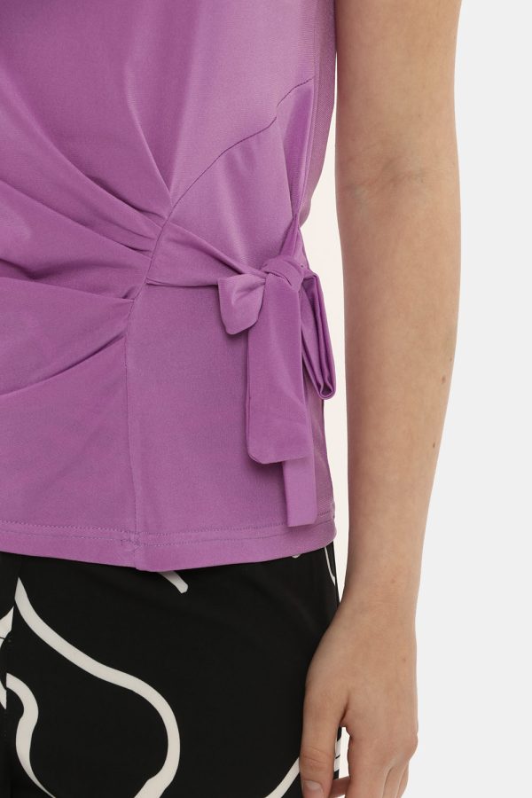 Top Vougue lilla - COMPOSIZIONE E VESTIBILITÀ:100% poliestereLa modella è alta 170 cm e indossa la taglia S. La vestibilità