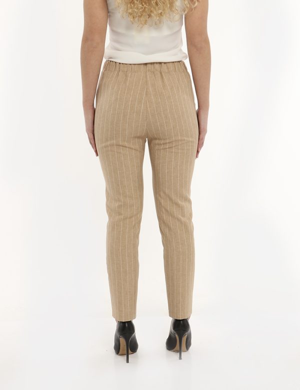 Pantalone Vougue beige in coordinato - COMPOSIZIONE E VESTIBILITÀ:100% poliestereLa modella è alta 170 cm e indossa la tagli