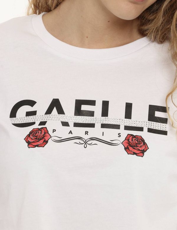 T-shirt Gaelle Paris bianca con glitter - COMPOSIZIONE E VESTIBILITÀ:100% cotoneLa modella è alta 170 cm e indossa la taglia