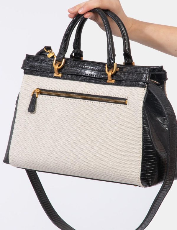 Borsa Guess Beige - Borsa a tracolla semirigida di medie dimensioni in simil pelle lucida, bicolor beige e nero. La bag si c