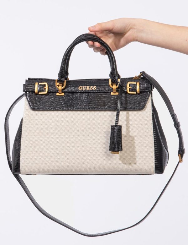 Borsa Guess Beige - Borsa a tracolla semirigida di medie dimensioni in simil pelle lucida, bicolor beige e nero. La bag si c