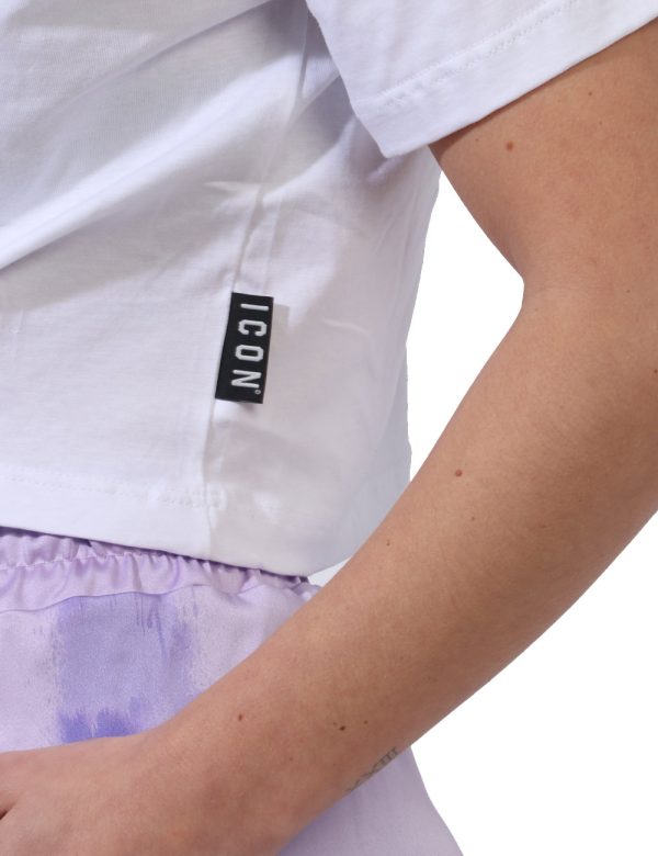 T-shirt Icon Bianco - T-shirt corta con ombelico scoperto su base bianca. Presente stampa logo brand in nero e lurex argenta