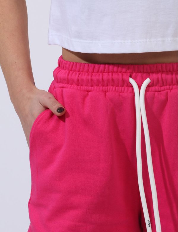 Shorts Icon Fucsia - Shorts felpati bicolor fucsia e bianchi con stampa logo brand bianco. Presenti tasche a taglio trasvers