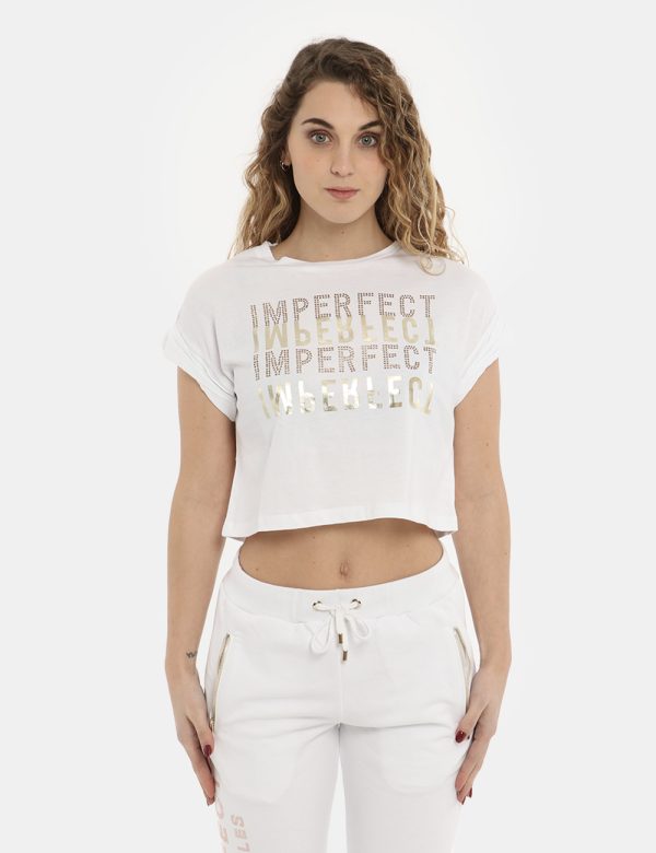 T-shirt Imperfect bianca con glitter - COMPOSIZIONE E VESTIBILITÀ:100% cotoneLa modella è alta 170 cm e indossa la taglia S.