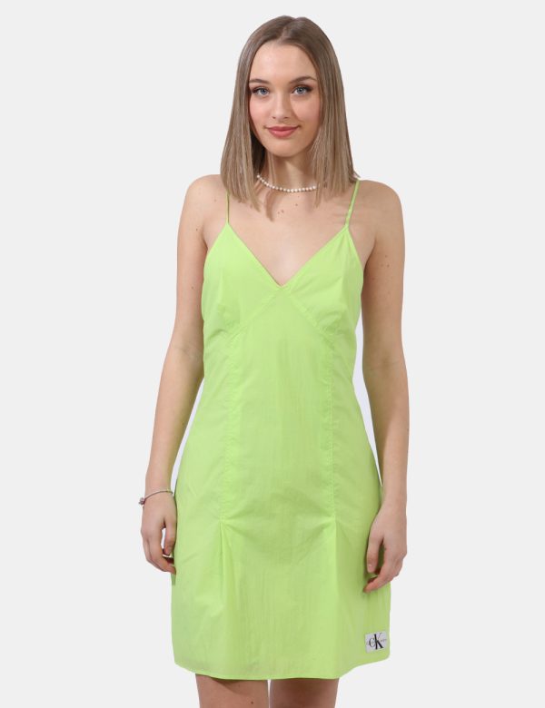 Vestito Calvin Klein Verde - Vestito corto in total verde lime sagomato ed in tela vela. Presenti spalline strette regolabil