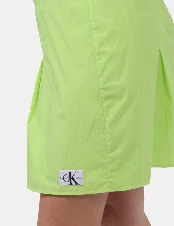 Vestito Calvin Klein Verde - Vestito corto in total verde lime sagomato ed in tela vela. Presenti spalline strette regolabil