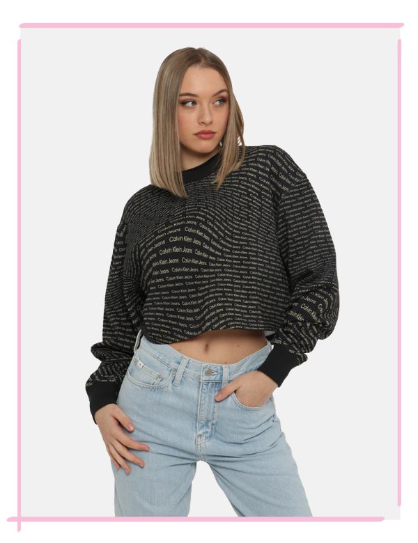 Felpa Calvin Klein Nero - Felpa corta con girocollo classico su base nera con stampa allover logo brand dorato. La vestibili