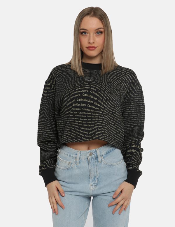 Felpa Calvin Klein Nero - Felpa corta con girocollo classico su base nera con stampa allover logo brand dorato. La vestibili