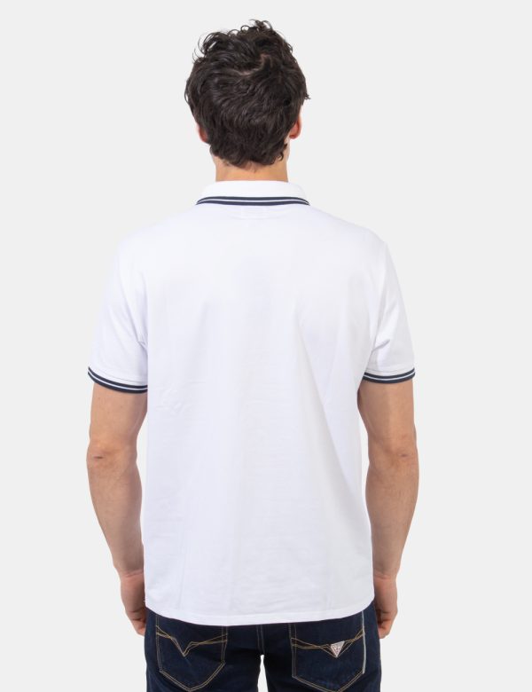 Polo Guess Bianco - Polo classica in total bianco con profilo blu navy richiamato sul colletto, sulle maniche e sul logo bra