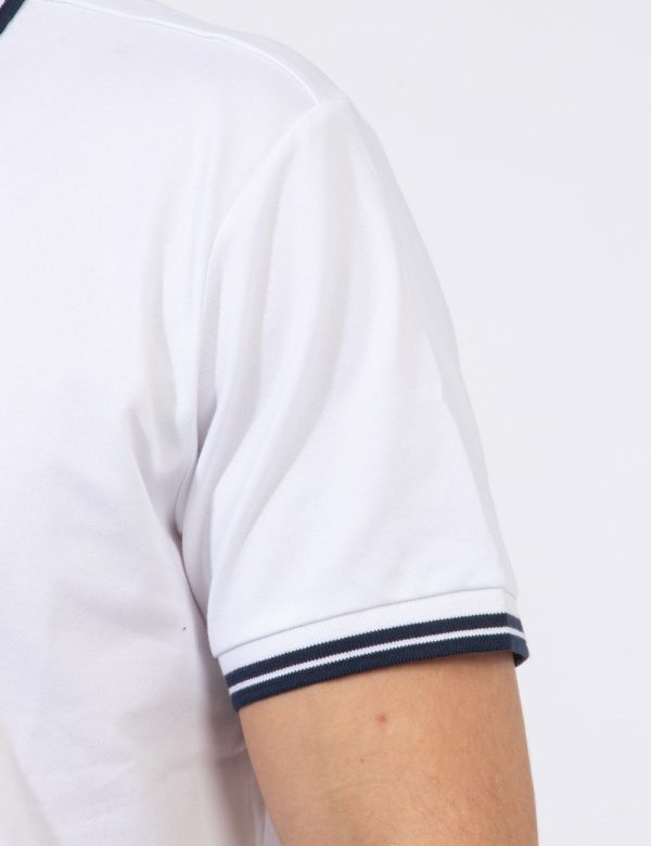 Polo Guess Bianco - Polo classica in total bianco con profilo blu navy richiamato sul colletto, sulle maniche e sul logo bra