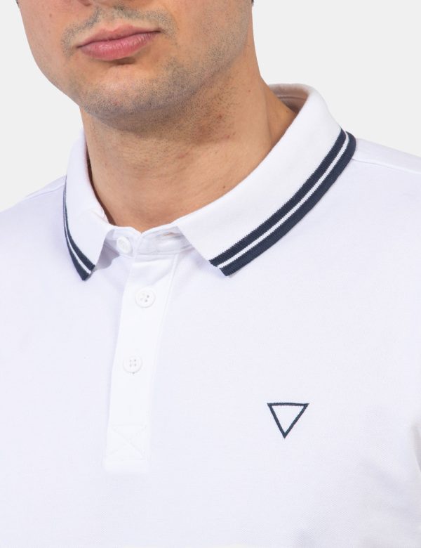Polo Guess Bianco - Polo classica in total bianco con profilo blu navy richiamato sul colletto, sulle maniche e sul logo bra