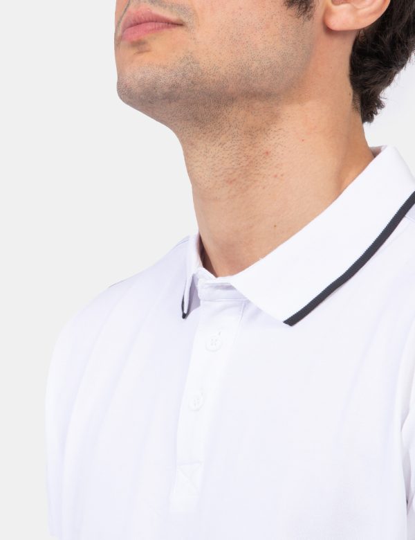Polo Guess Bianco - Polo classica in total bianco con stripes logo brand su manica sinistra più profilo nero sul colletto al