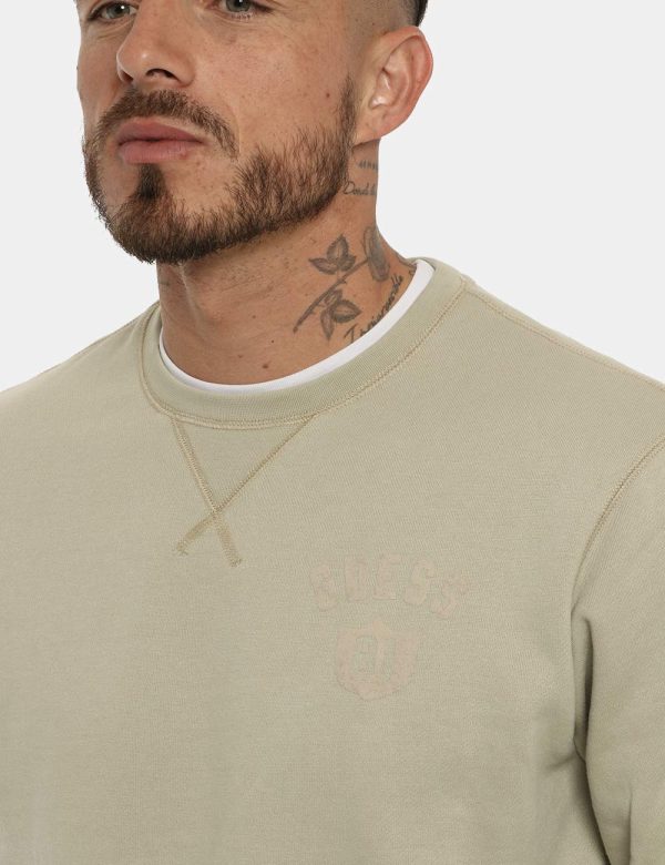 Felpa Guess beige - COMPOSIZIONE E VESTIBILITÀ:60% cotone 40% poliestereIl modello è alto 178 cm e indossa la taglia L. La v