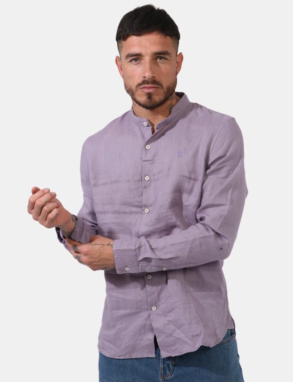 Camicia Timberland Viola - Camicia classica con colletto alla coreana in total lilla. Presente logo brand ricamato ad altezz