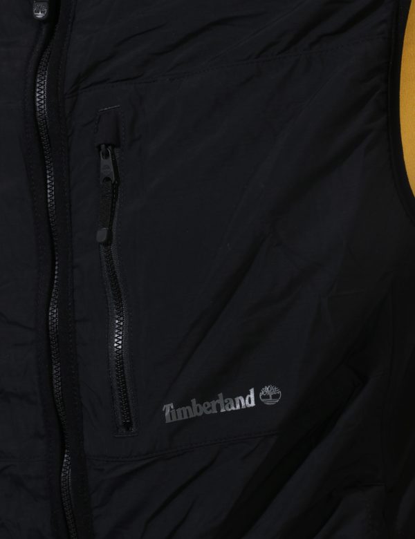 Smanicato Timberland Nero - Smanicato leggere ed impermeabile in total nero. Presemti tasche a taglio trasversale. La vestib