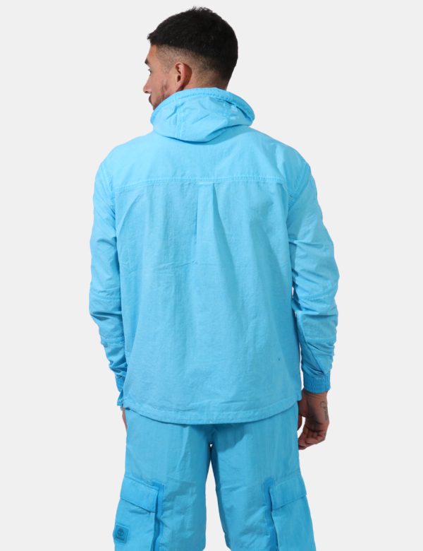 Giacca Timberland Azzurro - Giacca simil felpa con cappuccio in total azzurro intenso. Presenti tasche a taglio trasversale