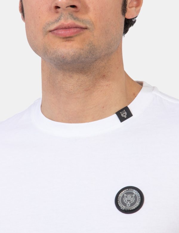 T-shirt Plein Sport Bianco - T-shirt classica in total bianco con piccolo patch logo brand ad altezza cuore più stampa later