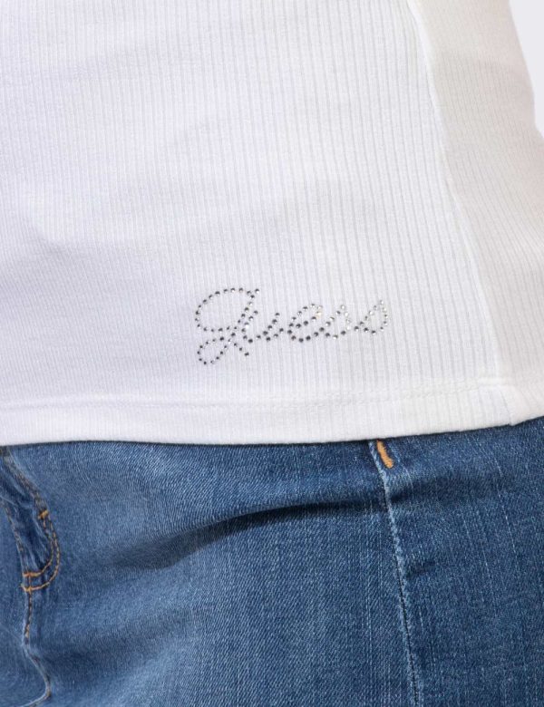 T-shirt Guess Bianco - T-shirt in total verde bianco con ampio girocollo. Presente logo brand in glitter argentati che richi