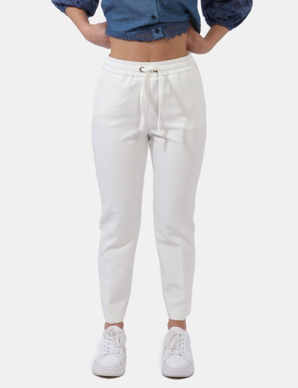 Pantaloni Liu-Jo Bianco - Pantaloni eleganti morbido in total bianco. Presenti tasche a taglio trasversale. La vestibilità è