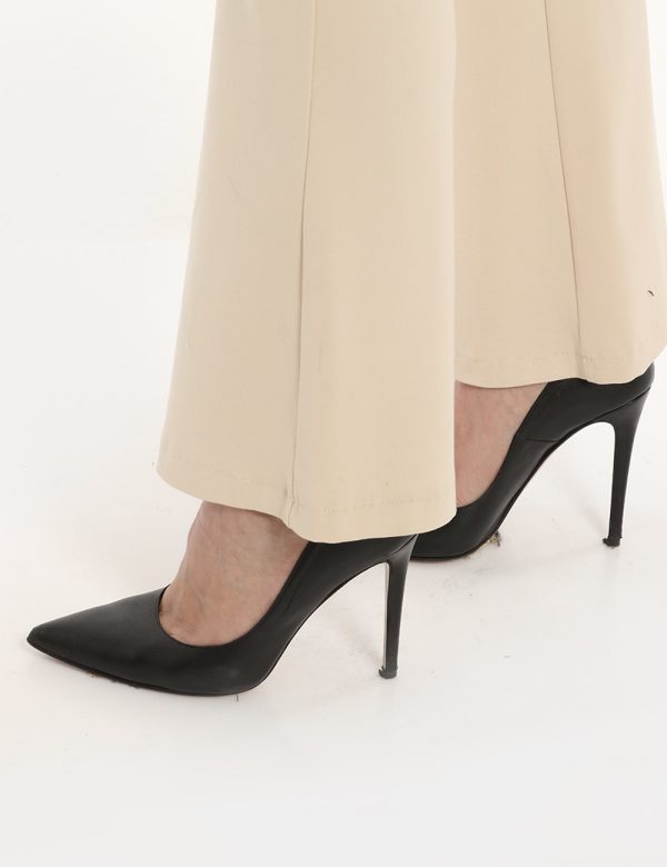 Pantalone Vougue beige - COMPOSIZIONE E VESTIBILITÀ:61% viscosa 34% nylon 5% elastaneLa modella è alta 170 cm e indossa la t