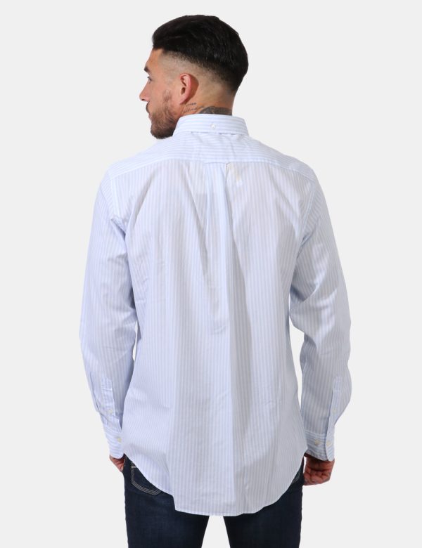 Camicia Gant Azzurro - Camicia classica da uomo rigata in bianco e azzurro pastello. Presente taschino a toppa ad altezza cu