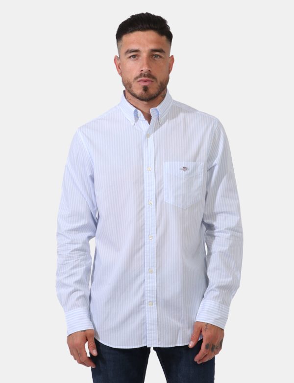 Camicia Gant Azzurro - Camicia classica da uomo rigata in bianco e azzurro pastello. Presente taschino a toppa ad altezza cu