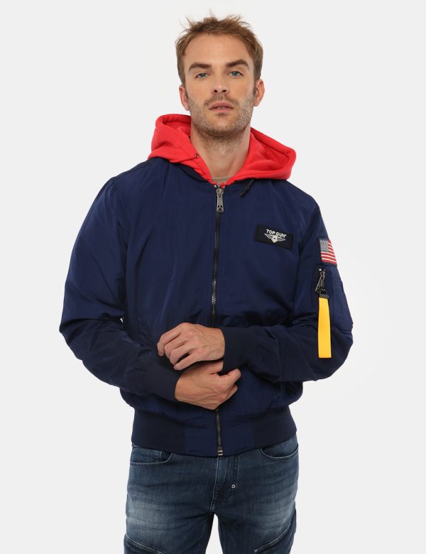Giacca Top Gun con cappuccio - Esterno: 100% poliestere - Fodera: 100% poliestereIl modello indossa la taglia L ed è alto 1