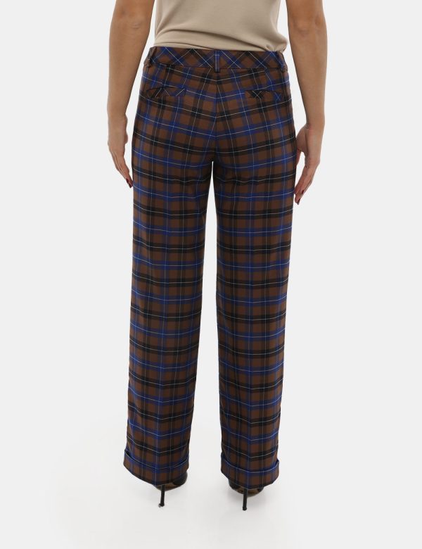 Pantalone Vougue in tartan - 63% poliestere 34% viscosa 3% elastanLa modella indossa la taglia S e la vestibilità del capo è