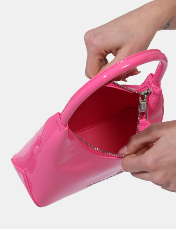 Borse Tommy Hilfiger Fucsia - Borsa a mano di piccole dimensioni in total fucsia in vernice con logo brand argentato. L'inte